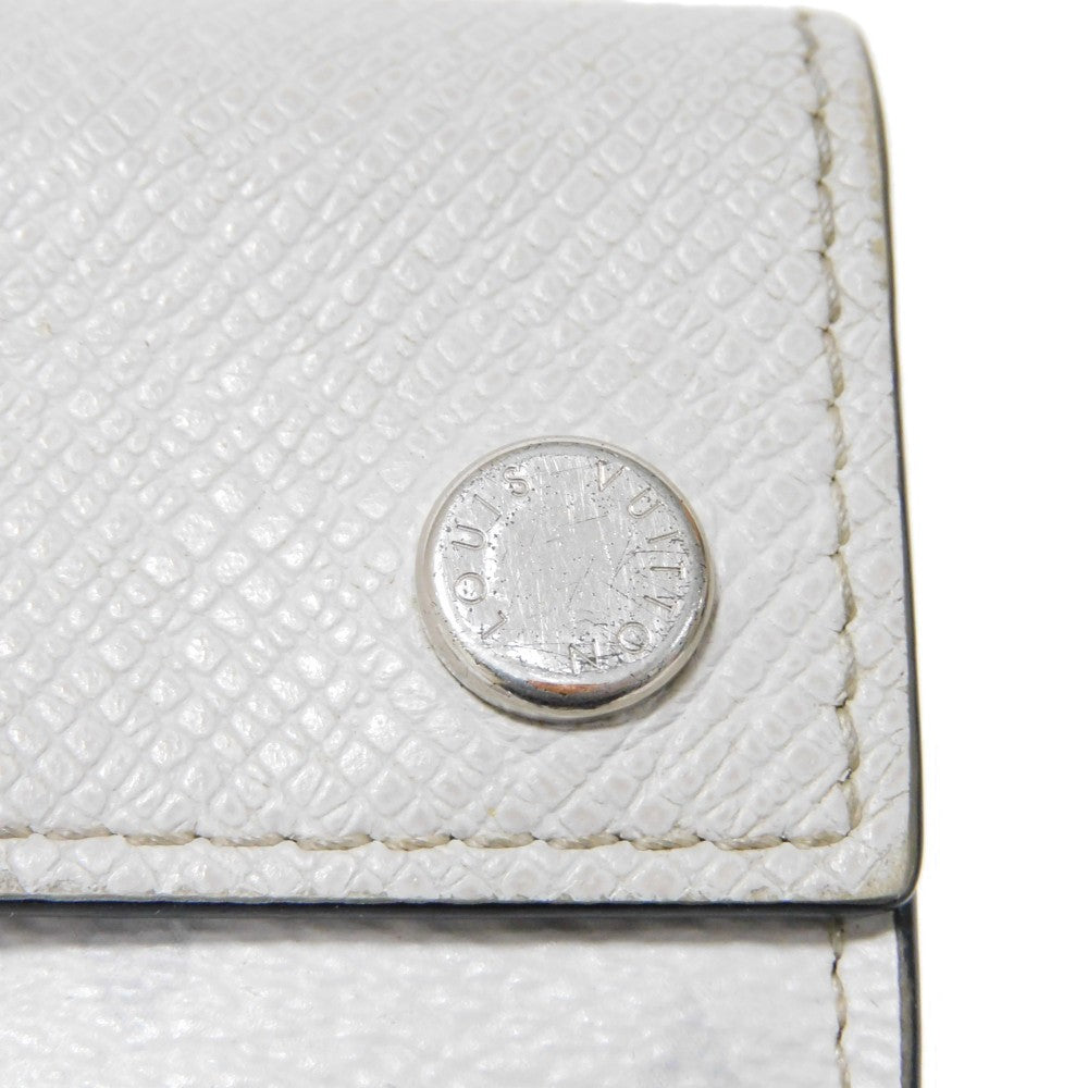 LOUIS VUITTON Tri-fold wallet M67621 Taiga leather x monogram canvas x smooth leather Antarctica Taiga Lama Monogram Discovery compact wallet