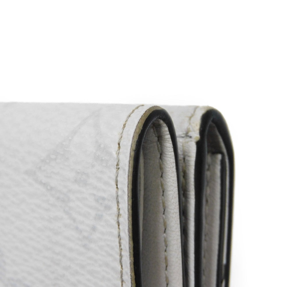 LOUIS VUITTON Tri-fold wallet M67621 Taiga leather x monogram canvas x smooth leather Antarctica Taiga Lama Monogram Discovery compact wallet