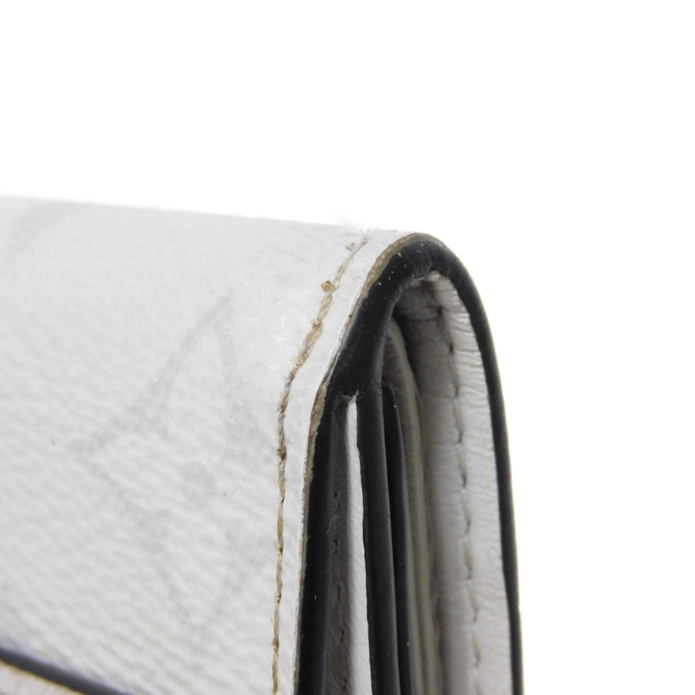 LOUIS VUITTON Tri-fold wallet M67621 Taiga leather x monogram canvas x smooth leather Antarctica Taiga Lama Monogram Discovery compact wallet