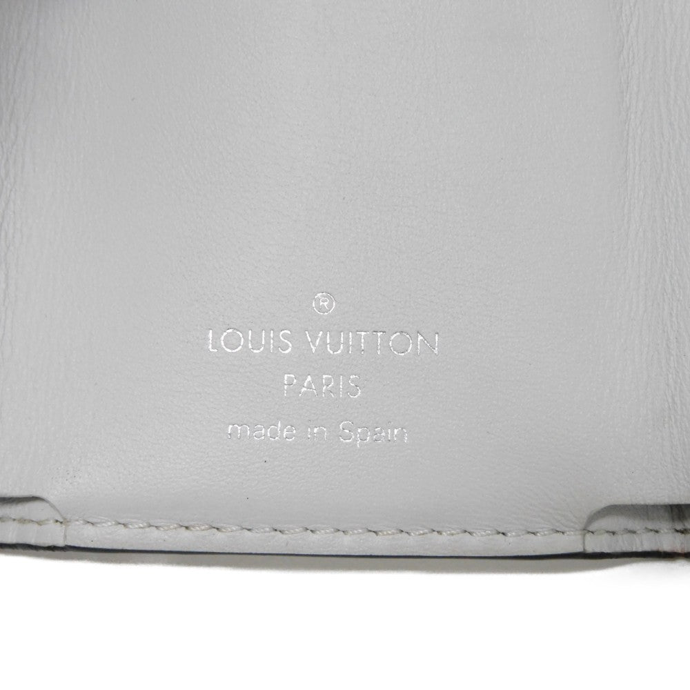 LOUIS VUITTON Tri-fold wallet M67621 Taiga leather x monogram canvas x smooth leather Antarctica Taiga Lama Monogram Discovery compact wallet