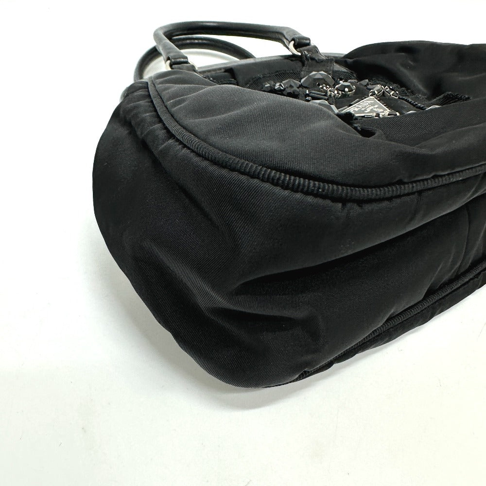 PRADA Handbag Nylon / leather black Evening bear