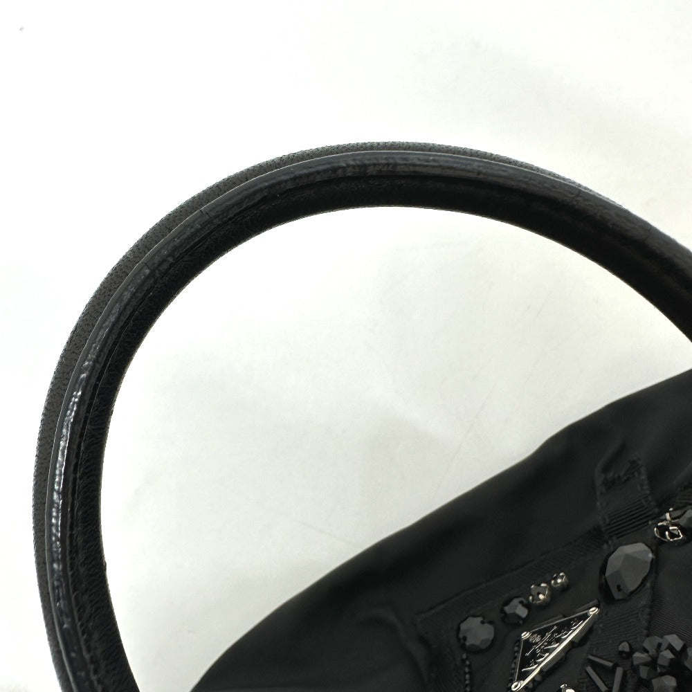 PRADA Handbag Nylon / leather black Evening bear