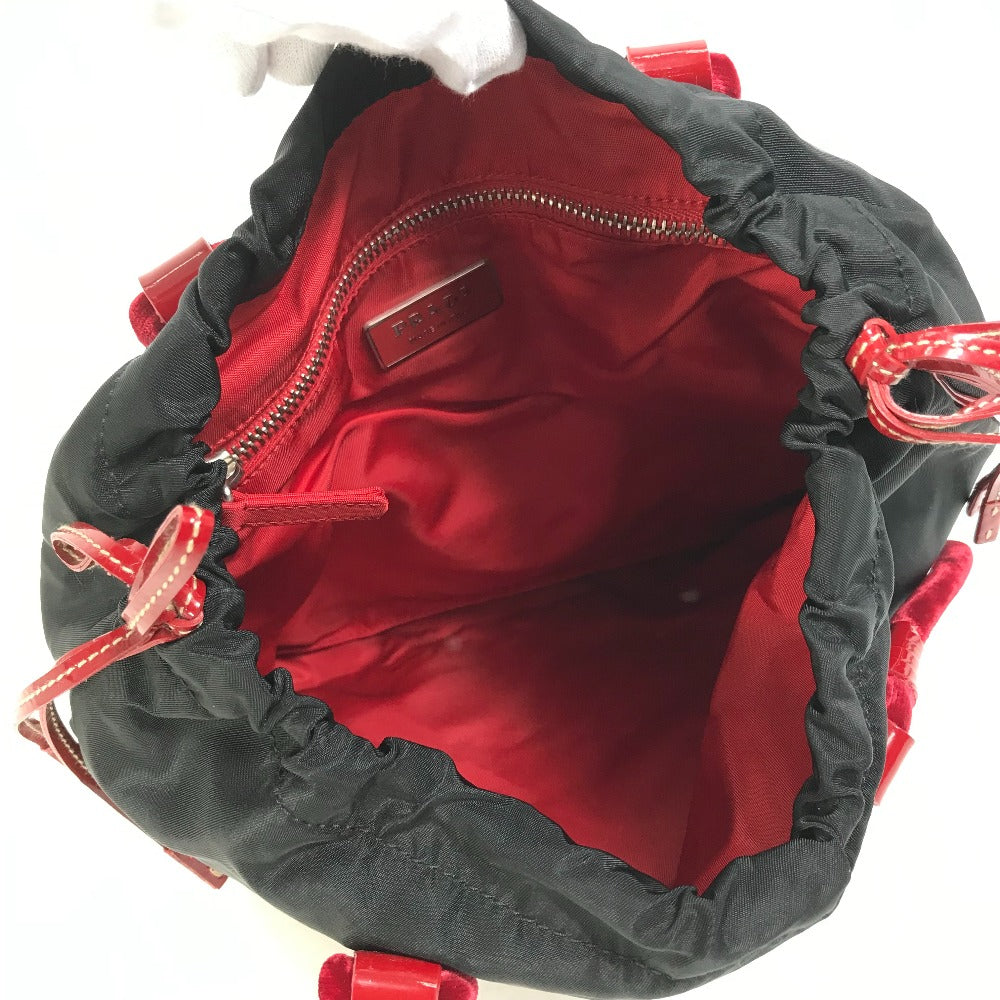 PRADA Handbag Patent leather, nylon, velour black By color logo drawstring bag triangle logo triangular logo plate