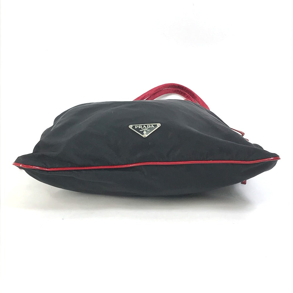 PRADA Handbag Patent leather, nylon, velour black By color logo drawstring bag triangle logo triangular logo plate