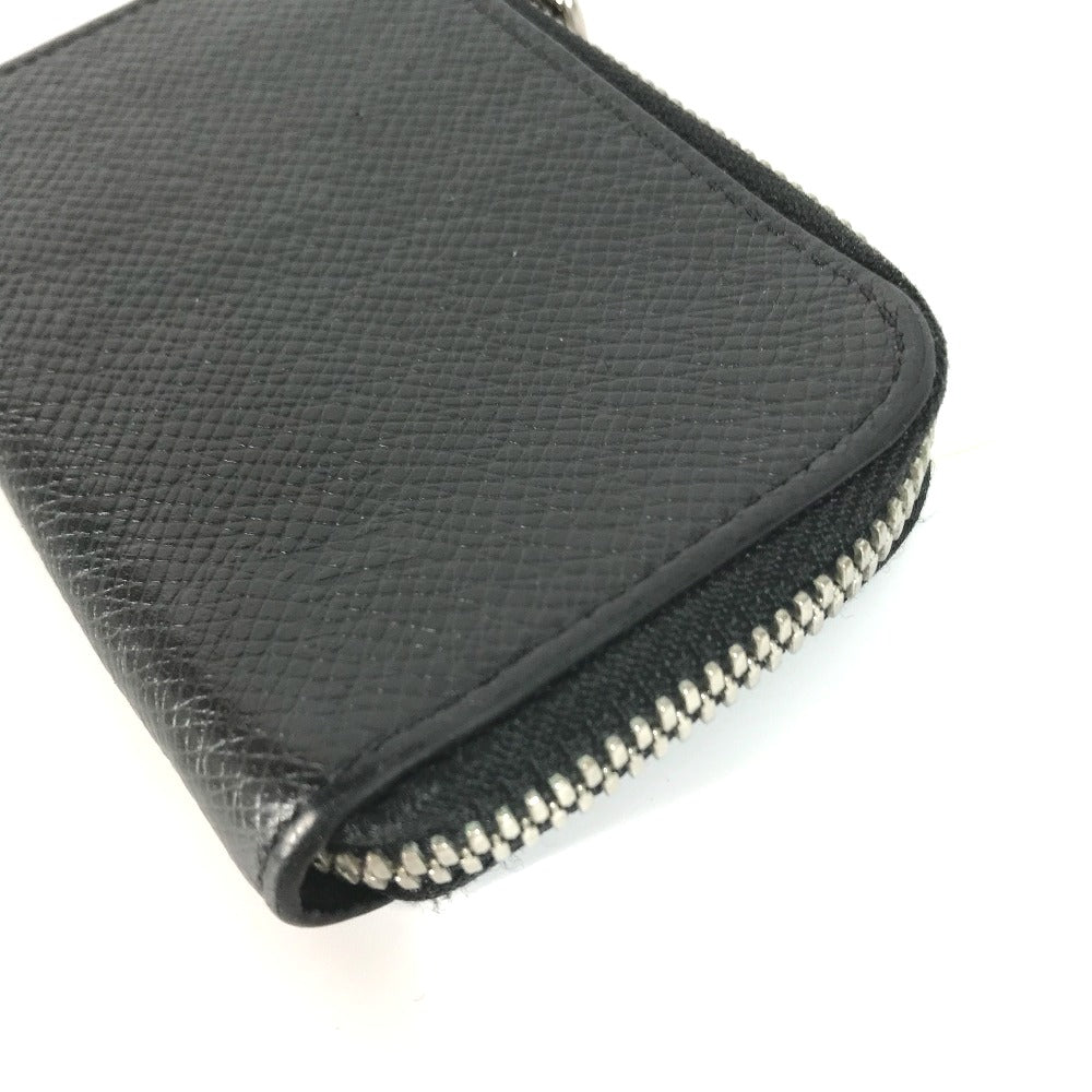 LOUIS VUITTON Coin case M63375 Taiga Leather black Taiga Porto Monnaie Jour mens Used Authentic