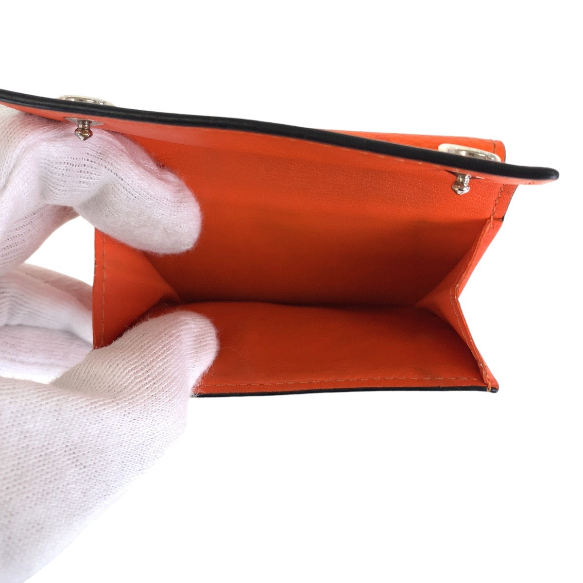 LOUIS VUITTON Tri-fold wallet M69245 leather Volcano orange Taiga Lama Monogram Discovery compact wallet