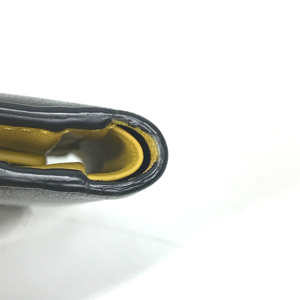 FENDI Folded wallet 7M0001 leather Black x yellow logo mens Used Authentic