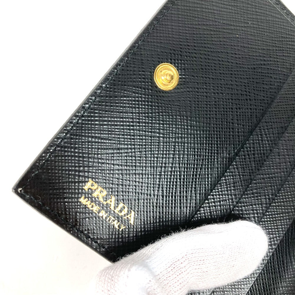 PRADA Folded wallet 1MV204 leather black All-over logo