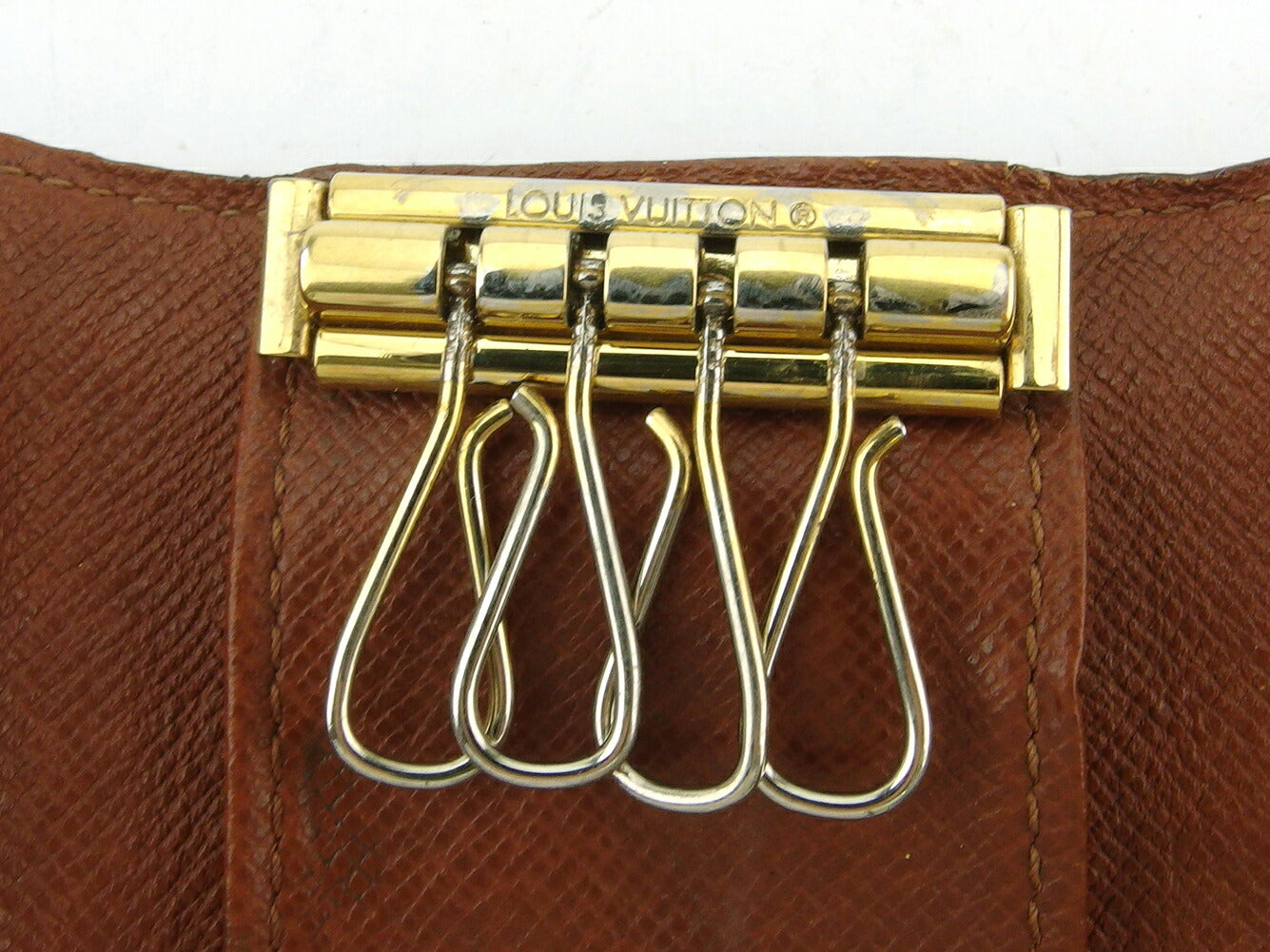 LOUIS VUITTON Key case Key holder M62631 Brown beige gold Multicles4