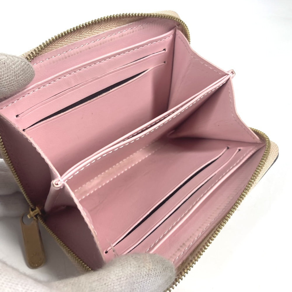 LOUIS VUITTON Coin case M58066 Monogram Vernis beige Monogram Vernis Rayure Zip around purse
