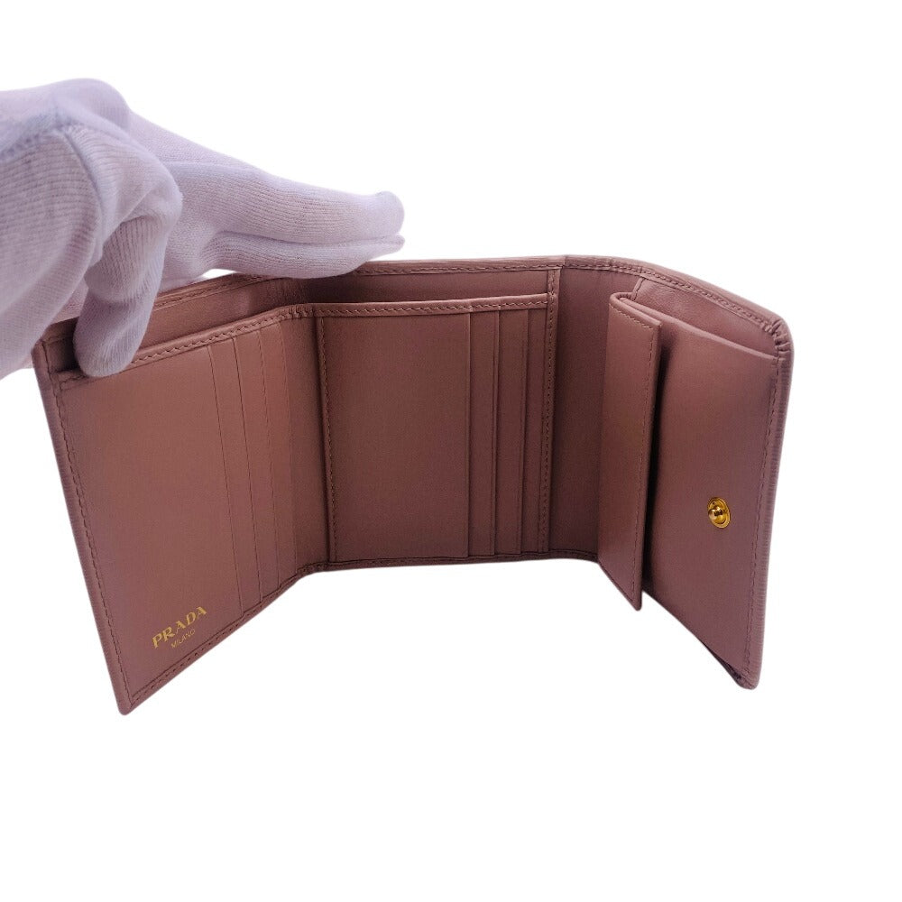 PRADA Tri-fold wallet 1MH176 leather beige Wittelomb Triangle