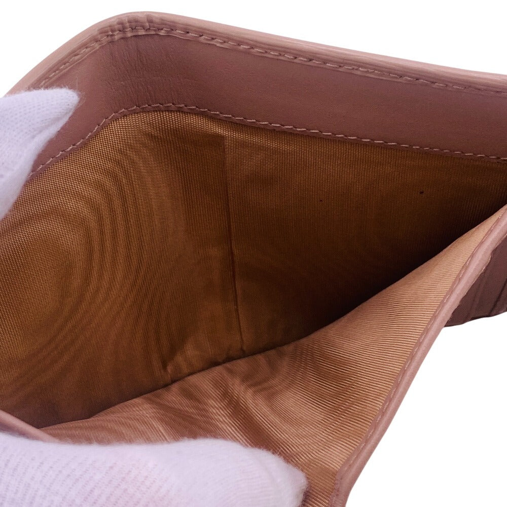 PRADA Tri-fold wallet 1MH176 leather beige Wittelomb Triangle