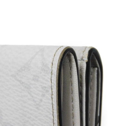 LOUIS VUITTON Tri-fold wallet M67621 Taiga leather x monogram canvas x smooth leather Antarctica Taiga Lama Monogram Discovery compact wallet