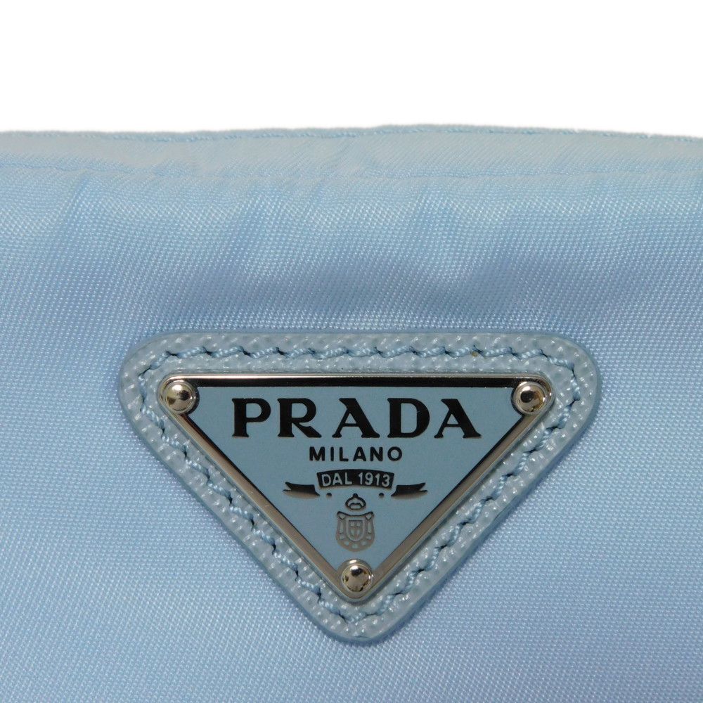 PRADA Clutch bag 1ND339 R067 F0076 recycled polyamide Light blue Triangle logo Micro Re-Nylon Pouch