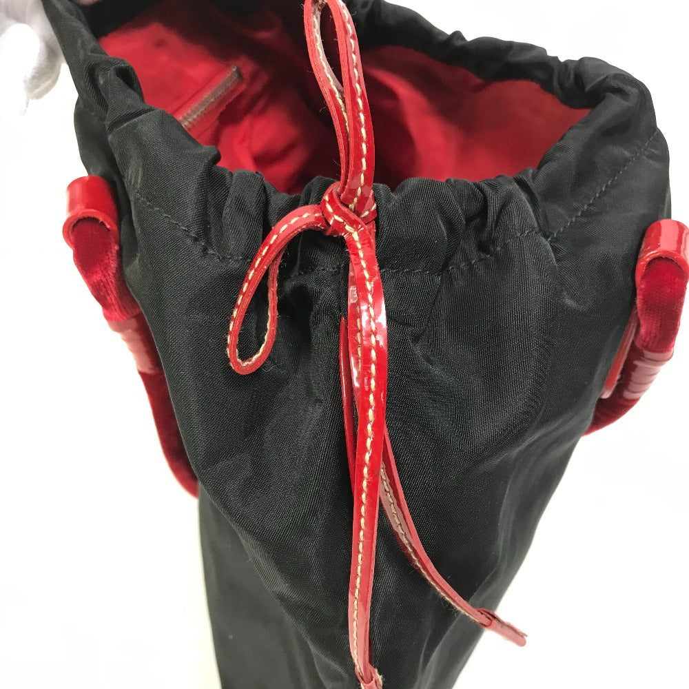 PRADA Handbag Patent leather, nylon, velour black By color logo drawstring bag triangle logo triangular logo plate