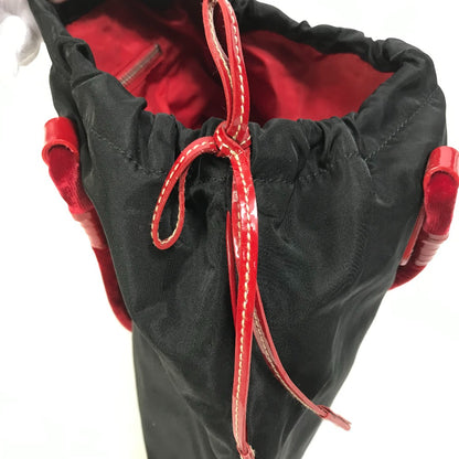 PRADA Handbag Patent leather, nylon, velour black By color logo drawstring bag triangle logo triangular logo plate