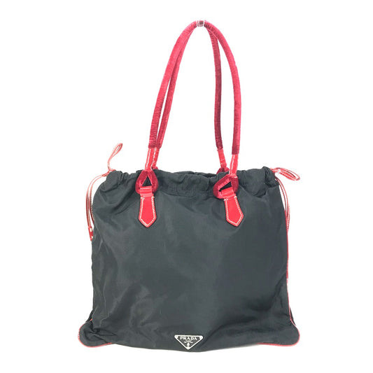 PRADA Handbag Patent leather, nylon, velour black By color logo drawstring bag triangle logo triangular logo plate