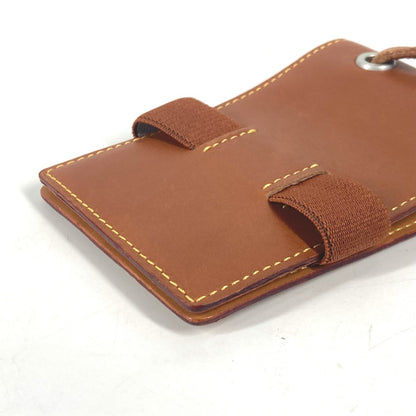 LOUIS VUITTON Card Case Nomad leather Brown Nomad Card Case with strap