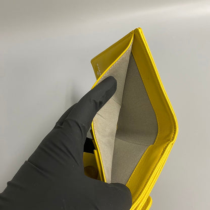 CHANEL Bifold Wallet leather yellow Caviar skin