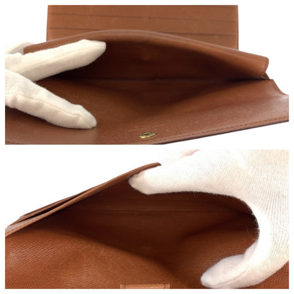 LOUIS VUITTON Long Wallet Purse M61215 PVC Brown Gold Metal Monogram Porte Tresor International