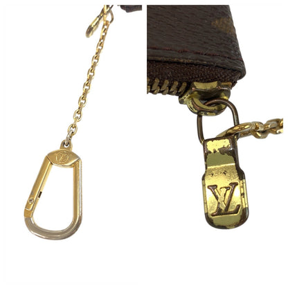 LOUIS VUITTON Coin case M62650 PVC Brown Gold Metal Monogram Pochette cree