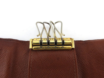 LOUIS VUITTON Key case Key holder M62631 Brown beige gold Multicles4
