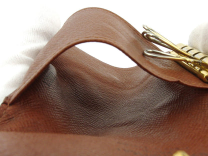 LOUIS VUITTON Key case Key holder M62631 Brown beige gold Multicles4