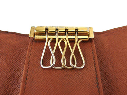 LOUIS VUITTON Key case Key holder M62631 Brown beige gold Multicles4