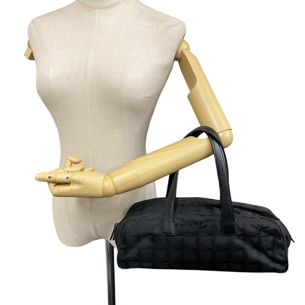 CHANEL Handbag Nylon, Leather black New travel line